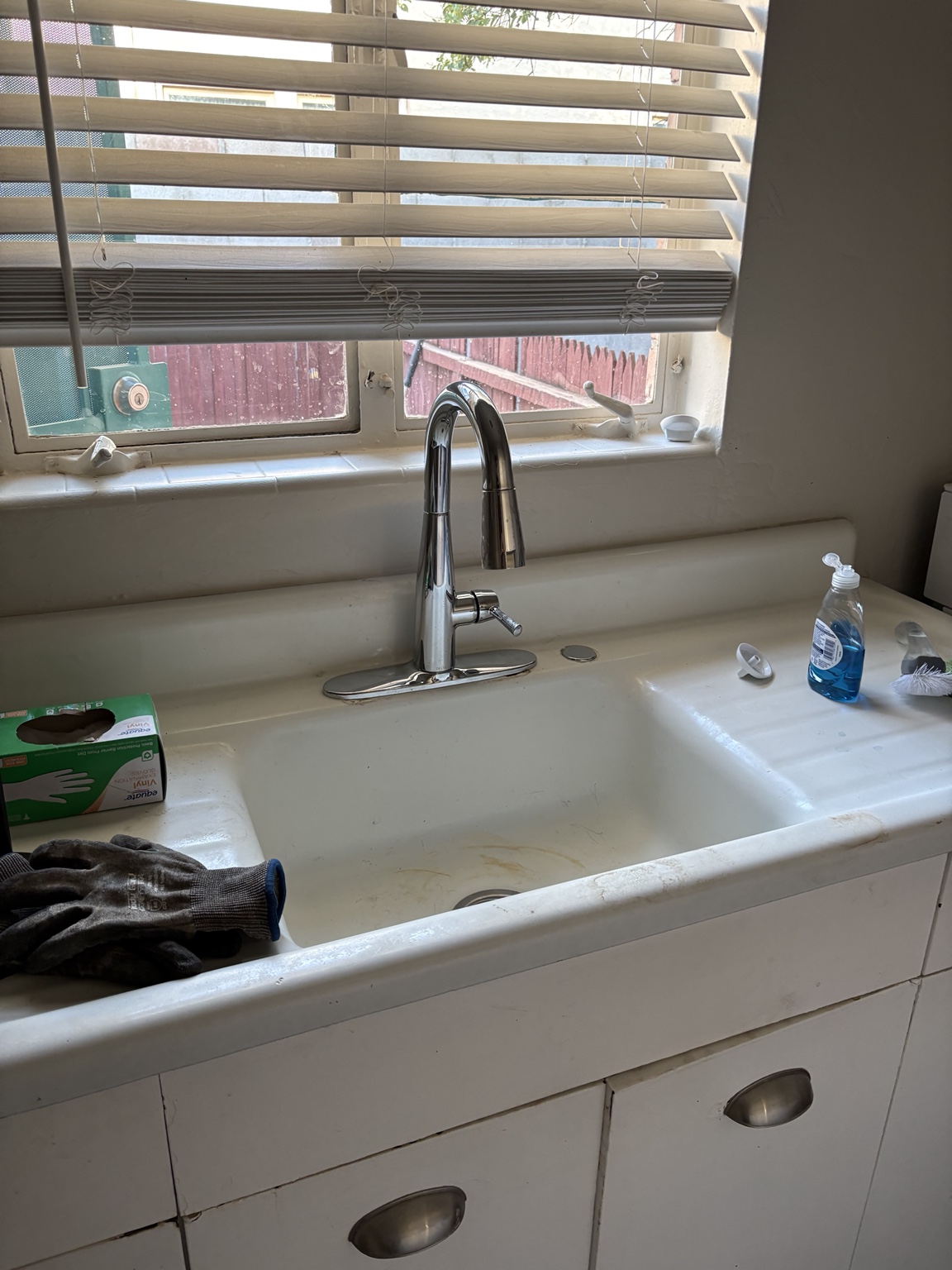 Installed kitchen faucet by Oasis Plumbing Solutions