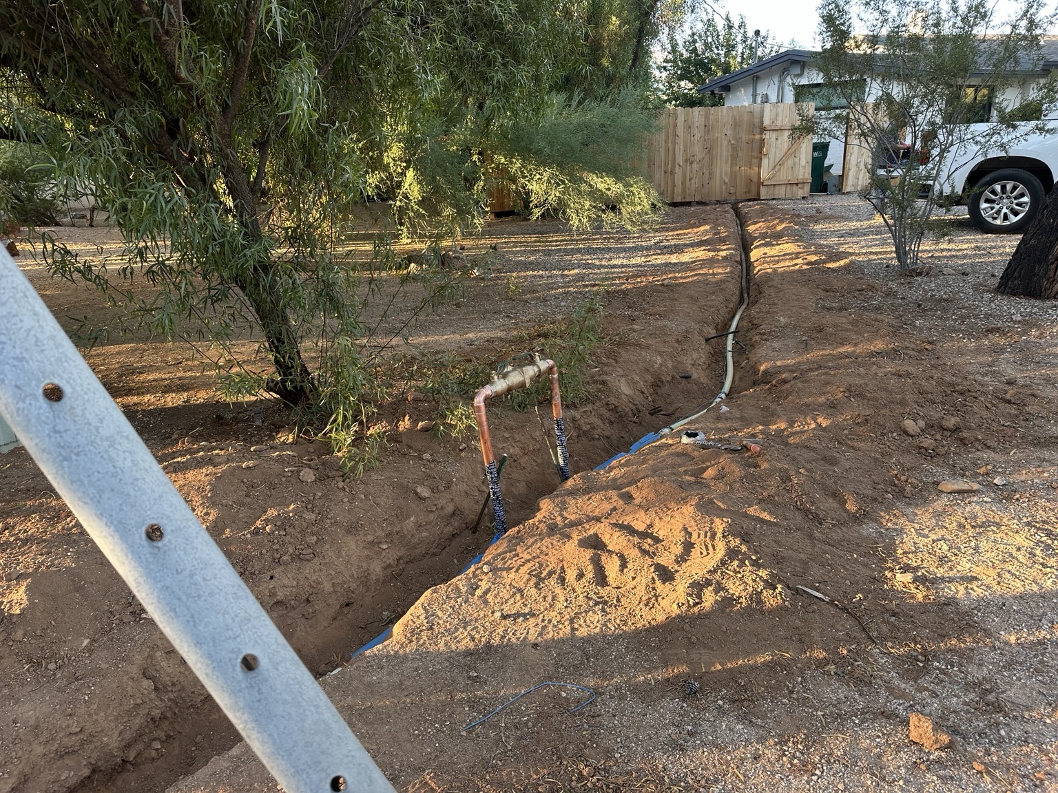 Underground water service line replacement with new copper backflow assembly in Tucson