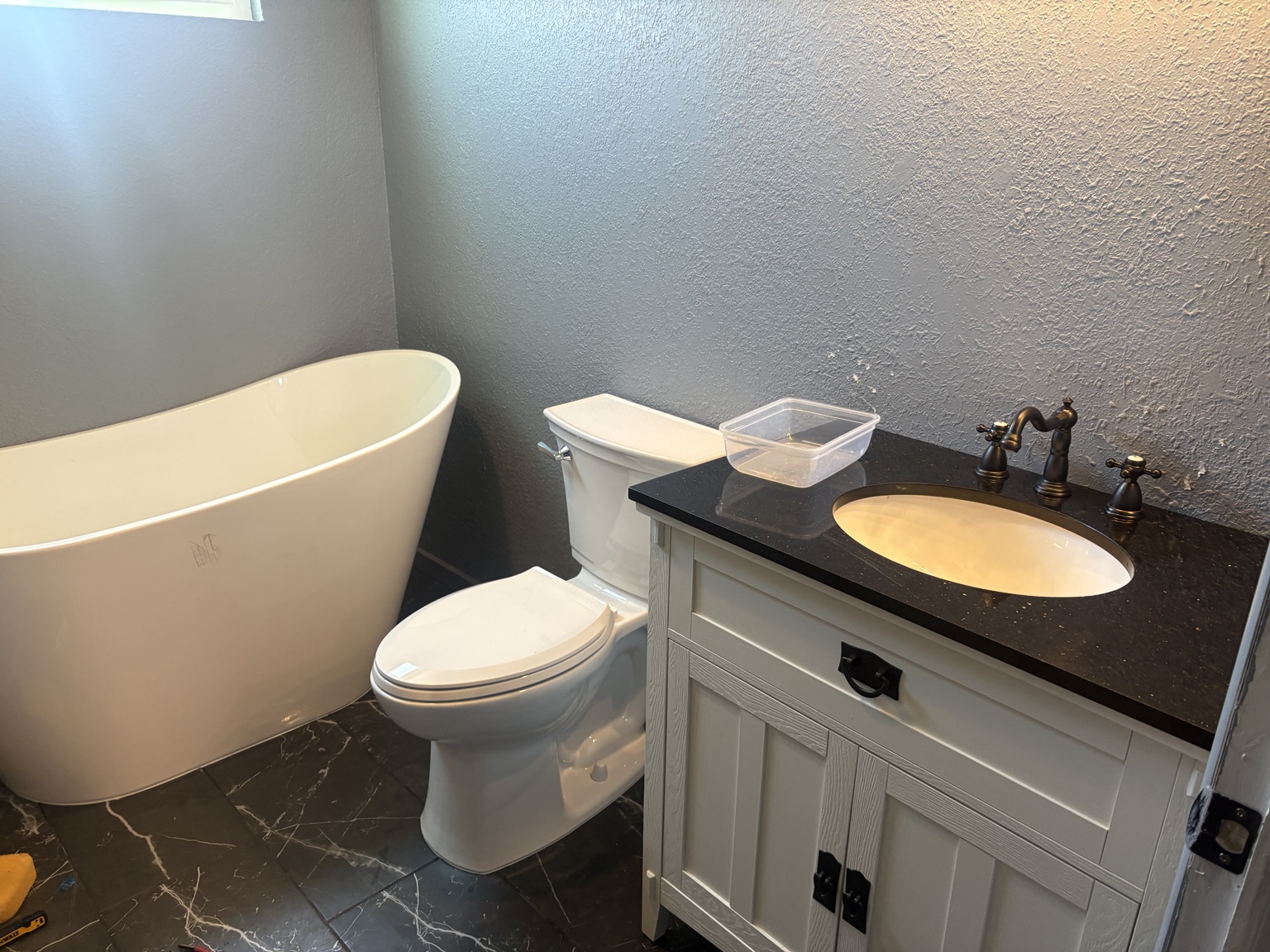 Completed bathroom plumbing fixtures installed by Oasis Plumbing Solutions in Tucson