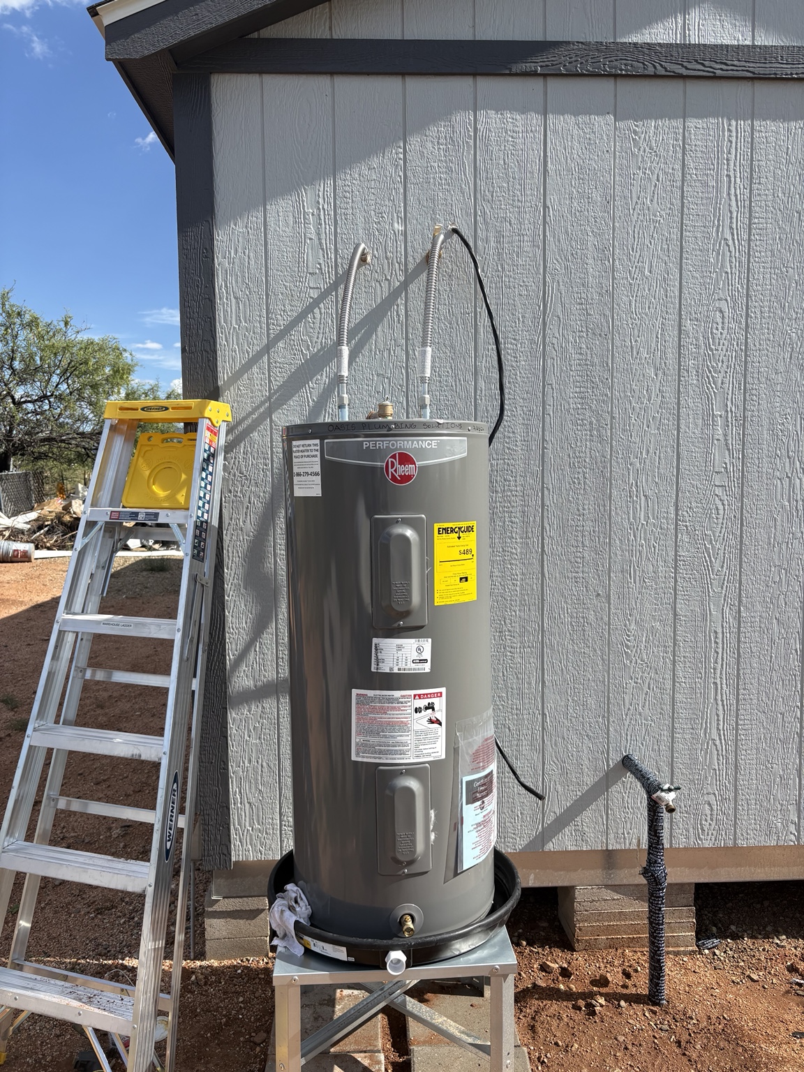 Electric water heater installation at a Southern Arizona property